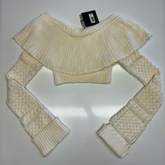 Nwt Very Cute Long Sleeve Crop Top In Ivory. Cropped Cotton Knit Sweater It Has Extra Long Sleeves It Folds Off The Shoulders For A Sexy Look. Size:4 Color: Ivory Condition: Excellent Condition 100% Cotton White Fitted Designer Sweater, Designer Fitted White Sweater, Fitted Luxury Cream Sweater, Luxury Fitted Cream Sweater, Elegant Fitted Winter White Sweater, Fitted Elegant Winter White Sweater, Elegant Fitted Beige Sweater, Luxury Long Sleeve Beige Top, Luxury Beige Long Sleeve Tops