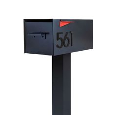 a black mailbox with the number sixty on it