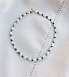 Green Pearl Necklace With Pearl Charm, Green Necklaces With Pearl Charm And Round Beads, Gift Green Beaded Necklaces With Pearl Chain, Green Beaded Pearl Chain Necklace For Gift, Green Beaded Necklace With Pearl Chain For Gift, Green Pearl Necklace With Colorful Beads As Gift, Green Pearl Necklace With Polished Beads, Green Pearl Necklaces With Round Beads, Green Pearl Necklace With Beaded Chain For Gifts