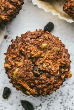 muffins with nuts and raisins on top, text reads gluten free & nut - free morning glory muffins