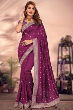 Created specifically for fashion elites, this purple silk saree which will lure the audience like never before.This sweetheart neckline and half sleeve blouse is beautified with zari work.It is present with a silk lightweight saree in purple color designed using zari work.This saree blouse can be customized up to the maximum size available in inches 58 around the bust. Slight color variation may occur due to photographic reasons. Purple Silk Saree, Saree For Wedding, Embroidered Saree, Half Sleeve Blouse, Zari Work, Purple Silk, Wedding Wear, Saree Wedding, Saree Blouse