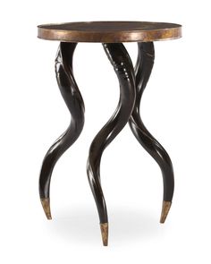 an artistically designed table with curved legs