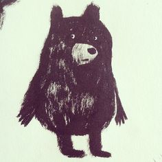 a drawing of a black bear on white paper