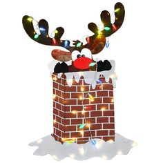 Emerging from a brick chimney, this red-nosed Reindeer seems perplexed with his predicament. His large antlers are strung with 20 multicolor C7 bulbs that fall in front of him. In addition to the light string, it is pre-lit from behind with 50 warm white LEDs lights that create additional sparkle and shine. This colorful holiday decoration is made with reinforced fabric materials wrapped around wire framing creating a strong and durable holiday trimming. For display in indoor or outdoor location Chimney Decoration, Brick Chimney, Christmas Yard Decorations, Christmas Yard, Christmas Inspo, Christmas Style, Red Nosed Reindeer, Jingle All The Way, Deck The Halls