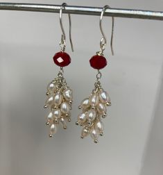 Light pink fresh water pearls, adorned with a red vivid Czech faceted crystal set in sterling silver. Fresh Water Pearls, Czech Crystal, Crystal Set, Water Pearls, Faceted Crystal, Fresh Water, Freshwater Pearls, Jewelry Earrings Dangle, Light Pink