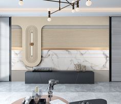 a modern living room with marble walls and flooring, including a coffee table in the center