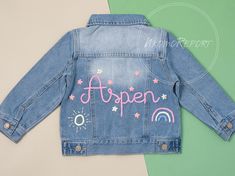 Welcome to the world of timeless style and craftsmanship! Our essential Baby & Toddler Denim Jacket is meticulously handmade with love, embodying a trendy denim aesthetic that stands out from the rest. 👶🧵 This personalized jacket is not just a piece of clothing; it's a cherished and distinctive gift, perfect for celebrating birthdays, baby showers, or any special milestone. 🎂🎉 Features: 👶 Handmade with Care 👶 Customizable Name 👶 Classic Jean Jacket Design -Distinctive and Unique: Elevate Customizable Blue Denim Jacket For Spring, Customizable Spring Denim Jacket, Customizable Long Sleeve Denim Jacket For Spring, Spring Birthday Long Sleeve Outerwear, Jean Jacket Design, Denim Aesthetic, Baby Jackets, Personalized Jacket, Kids Jackets