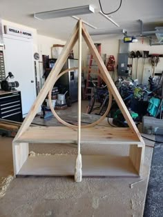 a wooden shelf sitting inside of a garage