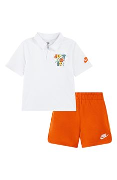 Soft cotton brings all-activity comfort to a graphic polo and coordinating sweat shorts that are perfect for your little one's playtime or rest time. Shorts have elastic waist 60% cotton, 40% polyester Machine wash, tumble dry Imported Playful Cotton Sports Bottoms, Casual Graphic Print Shorts For Playwear, Cotton Bottoms With Graphic Print For Playwear, Cotton Graphic Print Bottoms For Playwear, Playful Cotton Sports Shorts, Playful Nike Cotton Bottoms, Playful Cotton Bottoms By Nike, Nike Cotton Shorts For Playwear, Cotton Sportswear Shorts For Playwear