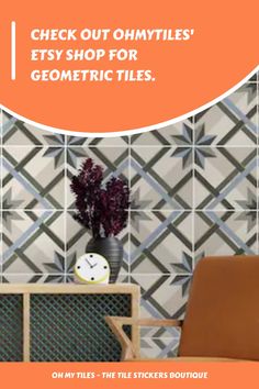 an orange chair sitting in front of a wall with geometric tiles on it and the words check out ohmytiles etsy shop for geometric tiles