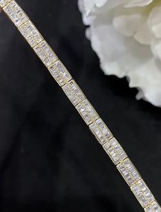 Dazzle onlookers with our exquisite two row diamond tennis bracelet in 18k gold. This stunning piece features double row of sparkling diamonds, each individually hand-set for maximum brilliance and shine. Crafted from high-quality 18k gold, this bracelet is not only beautiful but also durable and long-lasting. The diamonds are expertly cut and polished to enhance their natural beauty and fire, creating a truly breathtaking effect. Perfect for any special occasion, this 18k diamond tennis bracele Gold Tennis Bracelet, Simply Dress, Bracelet Diamond, Rose Bracelet, Diamond Tennis Bracelet, Camera Lenses, Tennis Bracelet Diamond, Sparkle Diamonds, Tennis Bracelet