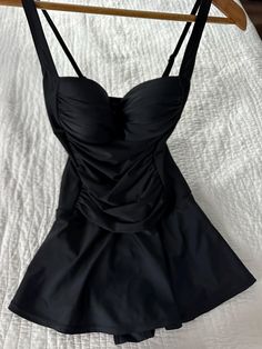 Venus St. Tropez Swim Dress Black Size 8 This elegant swim dress is ready for its moment in the sun, and it's deserving considering how unbelievably flattering it is. Its little secret: a control lining that offers mid-level shaping support. With a sweetheart neckline, ruched middle and feminine skirt that provides flirty coverage, this one-piece will easily become your new fave. Control lining Adjustable straps Molded cups Full coverage skirt Domestic or import of quality nylon/spandex tricot Only worn a few times, in lovely condition with no tears or pulls. From a smoke free home and washed in delicate detergent and ready to wear :) This item is still for sale on the Venus web site for $59.90 with out tax or shipping costs. I love it but it a little to tight in the top for me. I do have Feminine Skirt, St Tropez, Swim Dress, Sweetheart Neckline, Women Swimsuits, Dress Black, Bathing Suits, Adjustable Straps, Ready To Wear