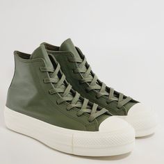 Converse Chuck Taylor All Star Hi High Top Utility Green / Egret / Silver Leather Women's Platform Sneakers / Boots A07131c Nwt Brand: Converse Model: Chuck Taylor All Star Lift Hi Style Code: A07131c Color: Utility / Egret / Silver Gender: Women's Size Guide: Us Women's 5.5 / Uk 3.5 / Eur 36 / Cm 22.5 Us Women's 6.5 / Uk 4.5 / Eur 37 / Cm 23.5 Us Women's 7.5 / Uk 5.5 / Eur 38 / Cm 24.5 Us Women's 8 / Uk 6 / Eur 39 / Cm 24.5 Us Women's 8.5 / Uk 6.5 / Eur 39.5 / Cm 25 Matte Meets Metallic Go For Khaki Leather Sneakers For Fall, Leather Khaki Sneakers For Fall, Green Leather High-top Sneakers Casual Style, Khaki High-top Leather Sneakers, Casual Green Leather High-top Sneakers, Casual Olive High-top Sneakers, Green Leather Converse Sneakers, Casual Olive Leather Sneakers, Converse Leather Sneakers For Fall