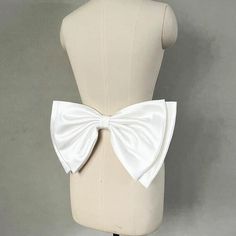 The length is around 15.5 inches (39cm). Metal Pin at back side. Easy to add on to your dresses. Available in many colors: White, Black, Green & more. Satin Fabric. White is soft white, not bright white. White Fitted Bow Tie For Parties, Fitted Satin Bow For Wedding, White Fitted Satin Sashes, Fitted Bow Tie With Bow Tie Back For Wedding, Fitted Wedding Bow Tie With Tie Back, Fitted White Party Sash, Wedding Ribbon Bow Tie, Fitted White Sash For Party, White Bow With Bow Tie Back For Party