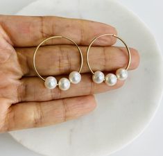 10K Solid Gold 6-7mm white semi-round freshwater cultured pearl endless hoop earrings  SIZE:   Outer diameter: 25mm Inner diameter: 24mm  Hoop thickness: 0.9mm Sold as a pair  REAL FRESHWATER PEARL REAL 10K GOLD NOT( PLATED OR FILLED)....  10k Stamped for Authenticity  Nickel and Lead Free... Hypoallergenic. FREE GIFT BOX Minimalist White Hoop Earrings For Anniversary, White Nickel Free Hoop Earrings, Nickel-free White Hoop Earrings For Anniversary, White Pearl Hypoallergenic Hoop Earrings, Hypoallergenic White Pearl Hoop Earrings, White Pearl Round Hoop Earrings, White Hoop Earrings For Anniversary, White Minimalist Round Hoop Earrings, Minimalist White Round Hoop Earrings