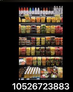 a grocery store display filled with lots of food