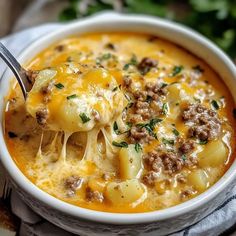 Cheesy Hamburger Potato Soup recipe Hamburger Cheesy Potato Soup, Hamburger Mashed Potato Recipes, Cheese Burger Potato Soup, Hamburger Meat Soup Recipes Easy, Potato Soup With Meat, Cheesy Potato Hamburger Soup, Potato Soup With Hamburger, Cheesy Hamburger Potato Soup Crockpot, Potato Soup With Hamburger Meat