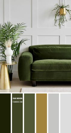 a living room with green couches, gold accents and potted plants on the wall