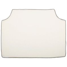 an upholstered headboard with white fabric and piping on the back side