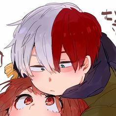 two people with red hair are hugging each other