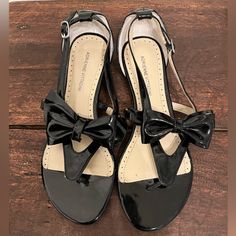 New Never Used. No Box Black Bow Sandals For Summer, Black Flat Heel Sandals With Bow, Black Sandals With Bow And Flat Heel, Black Sandals With Bow, Elegant Black Sandals With Bow, Formal Flat Sandals With Bow, Chic Black Sandals With Bow, Black Adjustable Low Heel Sandals, Adjustable Black Low Heel Sandals