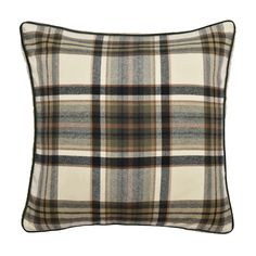 a plaid pillow on a white background