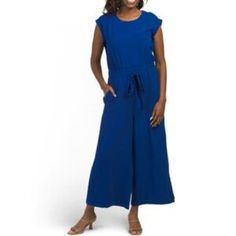 Brand New Color: Ultramarine Waist Tie Detail, Textured Finish Jewel Neck, Cap Sleeve Cropped Length, Wide Leg, 4 Pocket Style Back Zip Closure Inseam: 24in, Taken From Size 4 Polyester Imported Dry Clean Spring Chic Calvin Klein Jumpsuits And Rompers, Calvin Klein Summer Workwear Jumpsuits And Rompers, Calvin Klein Summer Jumpsuits And Rompers For Work, Chic Calvin Klein Jumpsuits And Rompers For Summer, Chic Calvin Klein Summer Jumpsuits And Rompers, Blue Short Sleeve Jumpsuit With Tie Waist, Blue Jumpsuits And Rompers For Summer Workwear, Blue Jumpsuits And Rompers For Work In Summer, Calvin Klein Jumpsuits And Rompers For Workwear