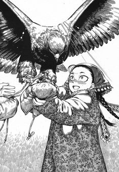 a woman holding an eagle over her shoulder while another person holds the bird up to her chest