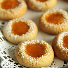 small cookies with powdered sugar are on a plate