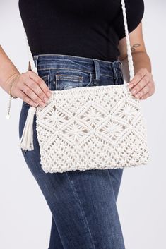 The Tying It All Together Shoulder Bag will be the cornerstone of your next hit outfit! It features secure tassel closure, a 22" strap, and a woven bohemian style. When paired with any outfit, such as a stylish denim and tank top combo, this bag will tie it all together! Length: 7.75" Width: 10.25" Bohemian Style, Tank Top, Shoulder Bag, Tank Tops