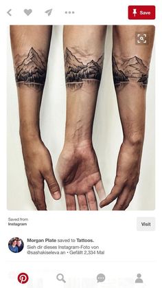 two people holding hands with mountains and trees on their arms, both showing the same tattoo