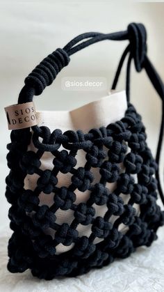 black and white crochet purse with ribbon