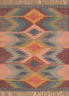 an old navajo rug with multicolored patterns and fringes on the bottom half