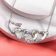 Choose name and birthstone for each heart for a completely unique and custom look, which of the meaning you two are together. This adorable heart sterling silver birthstone necklace is of top quality, means to last a lifetime. It would make a beautiful gift for a mom, or as part of a memorial charm necklace! Personalized Heart-shaped Birthstone Necklace For Valentine's Day, Personalized Heart Birthstone Necklace For Valentine's Day, Silver Double Heart Custom Name Necklaces, Customizable Silver Heart-shaped Jewelry, Customizable Silver Heart Jewelry, Personalized Silver Heart Necklace In Stainless Steel, Personalized Heart Birthstone Necklace For Mother's Day, Personalized Heart Pendant Birthstone Necklace For Anniversary, Personalized Heart Birthstone Necklace For Anniversary