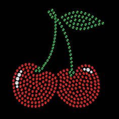 a pair of cherries with red and green dots in the shape of hearts on a black background