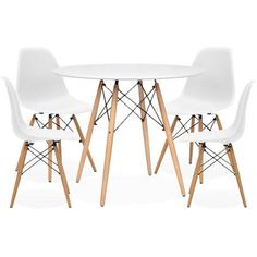 three white chairs and a table with wooden legs