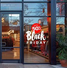 a black friday sign is displayed in the window of a store