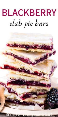 blackberry slab pie bars stacked on top of each other