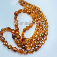 "Natural Spessartite Garnet Plain Nuggets beads, Fanta Garnet Beads Orange Garnet 22 Inches Strand for Jewelry Making Shape: Plain Nuggets Gemstone: Spessartite Garnet Weight - 367.25 ct Appx. Size: 6*7.7-14*16 mm Length: 22 Inches *Fine Quality Gemstone with Price *100% Genuine Gemstone \"We manufacture all gemstones, shapes, sizes in our Manufacturing Unit and also take customize orders\" \"For queries Kindly message us\" For more products visit our Etsy Shop: https://www.etsy.com/in-en/shop/K Amber Polished Oval Beads Jewelry, Amber Polished Oval Bead Jewelry, Orange 8mm Beads For Jewelry Making, Amber Necklaces With Polished Oval Beads, Orange Gemstone Beads For Jewelry Making, Amber Gemstone Beads Jewelry, Orange Faceted Oval Beads, Orange Faceted Beads, Orange Round Beads For Jewelry Making