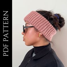 a woman wearing a pink knitted headband