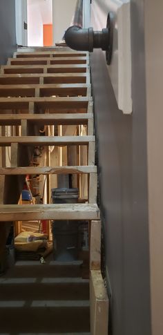 the inside of a building being built with wooden slats