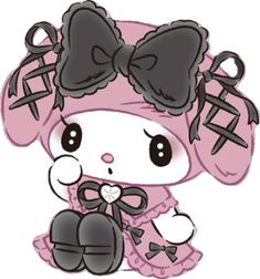 a pink and black hello kitty sitting on top of a white floor