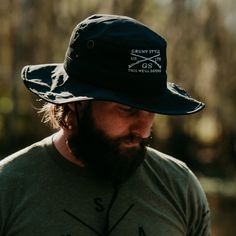 Grunt Style Boonie Hat in Black This product is being 86ed! Quantities and sizes are limited - What we have is what we have, so get them before they’re gone. OUT IN THE BOONDOCKS This Grunt Style Boonie Hat is perfect for any adventure out in the sun. If you're heading out on an outdoor adventure and need protection from the sun, the Grunt Style Boonie Hat is a great choice! It features the Grunt Style logo, a drawstring and durable ripstop fabric, so you'll be all set for any summer activities. Hooey Hats, The Boondocks, Boonie Hat, Patriotic Tees, Grunt Style, Patriotic Outfit, Black Baseball Cap, Fishing Hat, Ripstop Fabric