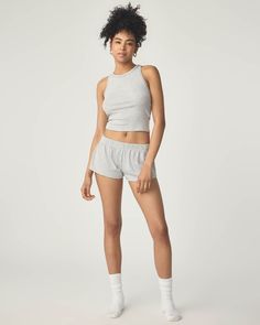 This soft ribbed sleep short was designed with our signature cheeky fit. Just flirty enough while staying comfy all day and night. Wear it for slumber and beyond. Casual Seamless Pajama Shorts For Loungewear, Trendy Solid Color Pajama Shorts For Loungewear, Athleisure Ribbed Shorts For Loungewear, Sporty Ribbed Shorts For Loungewear, Ribbed Loungewear Tops, Ribbed Short Length Tops For Loungewear, Trendy Stretch Pajama Shorts For Loungewear, Trendy Ribbed Loungewear Shorts, Orchid Bouquet