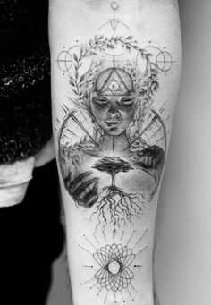 a person with a tattoo on their arm and the image of a woman's face