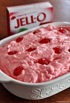 a bowl of jello next to a carton of jello