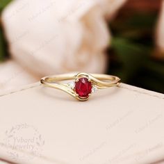 "(Please confirm your US size when you make an order) Jewelry Details Gold Type : Solid 18k gold Center Stone: Natural Ruby 4*5mm, Approximately 0.5ct Cut:Oval Cut Side Stone: Natural Diamond,0.03ctw Color: G-H Clarity: SI1 Cut: Round Cut / 3EX Band Width: approximately 1.5mm SKU: YR0600 ~*-*~Purchase Guarantee: - All our jewelry is handmade, and each process is refined. - 14 Day Refund Guarantee. - All our products are Free Shipping. - Free Gift Box&Packing. ~*-*~Please contact us if you ne Art Deco Ruby Ring, Unique Ruby Rings, Ruby Ring Designs, Twist Engagement Ring, Graduation Ring, Stone Ring Design, Engagement Ring Oval Cut, Gold Ruby Ring, Ruby Wedding Band