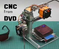 an electronic device that is on top of a table with the words cnc from dvd