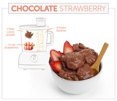 a bowl filled with chocolate and strawberries next to a blender