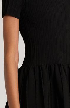 "Find VALENTINO Pleated Sweater Dress on Editorialist. A slim-fitting rib bodice gives way to a pleat-textured full skirt on this sweater-dress knit from silky stretch-enhanced yarns. 33\" length (size Medium) Hidden back-zip closure Crewneck Short sleeves 63% viscose, 21% polyamide, 14% polyester, 2% elastane Dry clean Made in Italy" Luxury Pleated V-neck Mini Dress, Luxury Winter Mini-length Sweater Dress, Black V-neck Knit Sweater Dress, V-neck Textured Knit Sweater Dress, Luxury V-neck Knit Sweater Dress, Dress Knit, Full Skirt, Valentino Garavani, Knit Dress